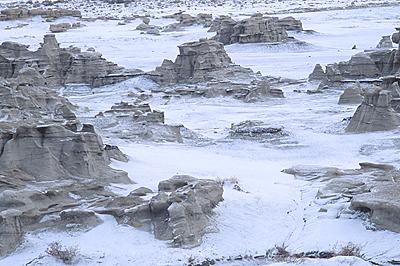 badlands with snow